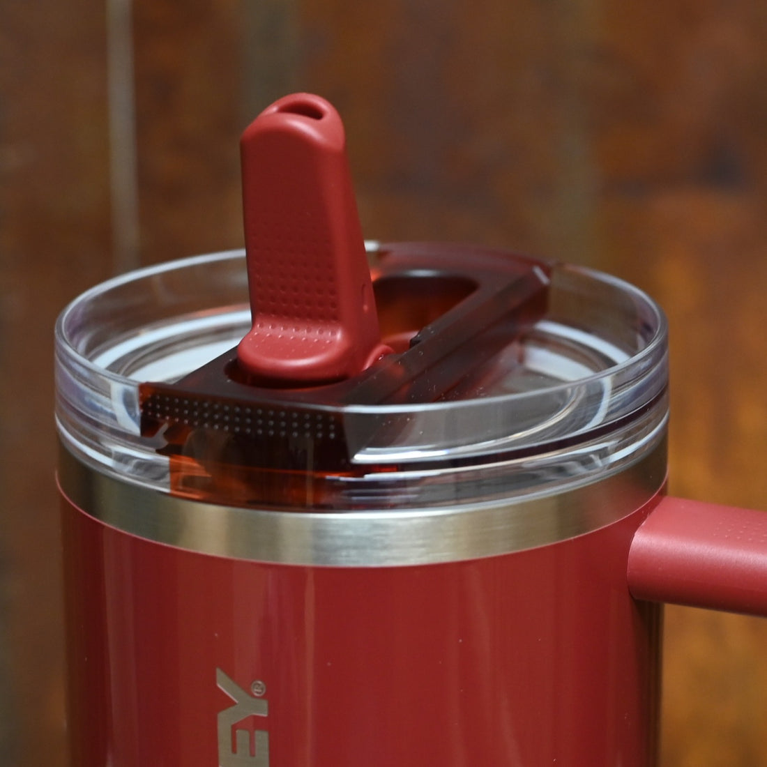 Stanley Quencher ProTour Flip Straw Tumbler 40 oz in Cranberry Gloss with flip straw lid and ergonomic comfort-grip handle