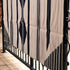 View of Pendleton robe-size blanket in navy and white jacquard wool blend