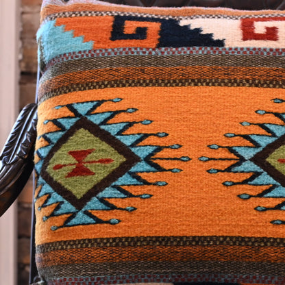 View of close up of orange pillow