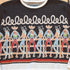 View of Long Tall Texan cropped sweater in bronco brown with embroidered cowboy characters, contrasting cuffs, and rope detail