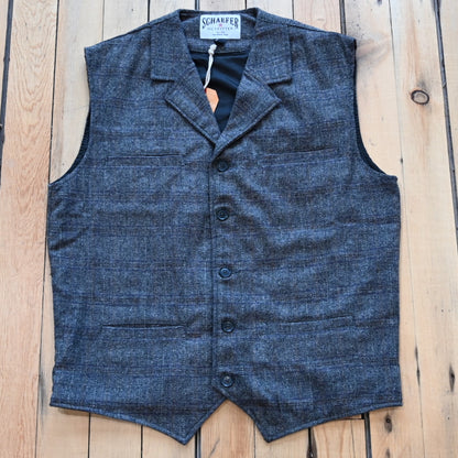 View of vest in herringbone heather gray