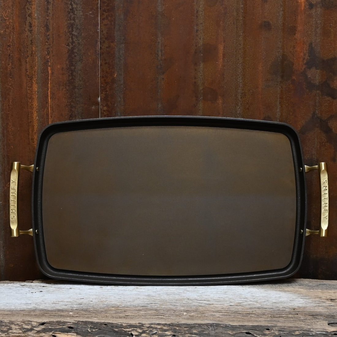 View of Smithey Ironware Double Burner Griddle with polished surface and dual riveted handles