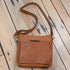 Gun Toten Mamas tan brushed cowhide cross-body conceal carry bag