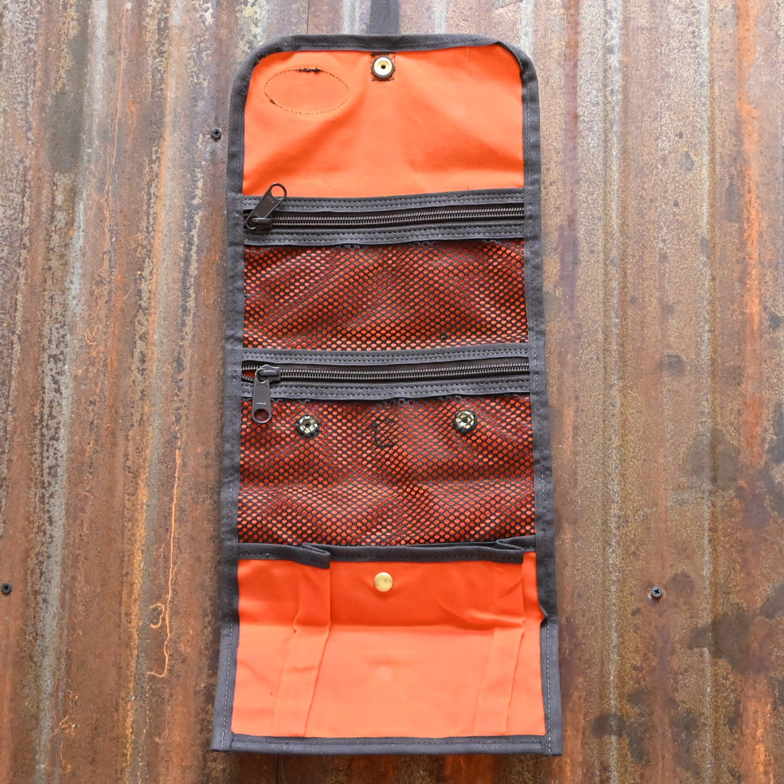 Frost River Roll Up Travel Kit in Orange view of travel kit