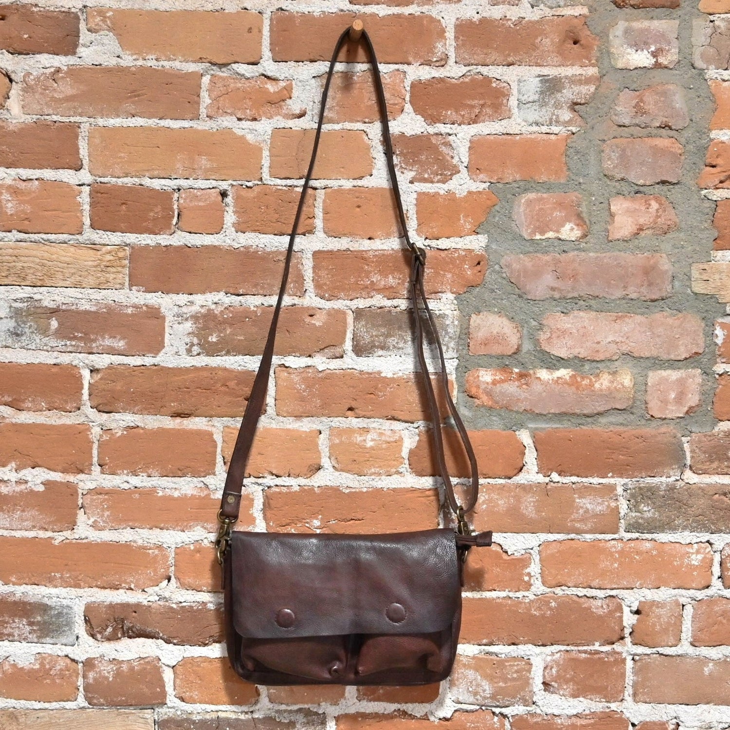 Latico Terra Crossbody with Zipper and Hidden Magnetic Closure in Brown view of front hanging