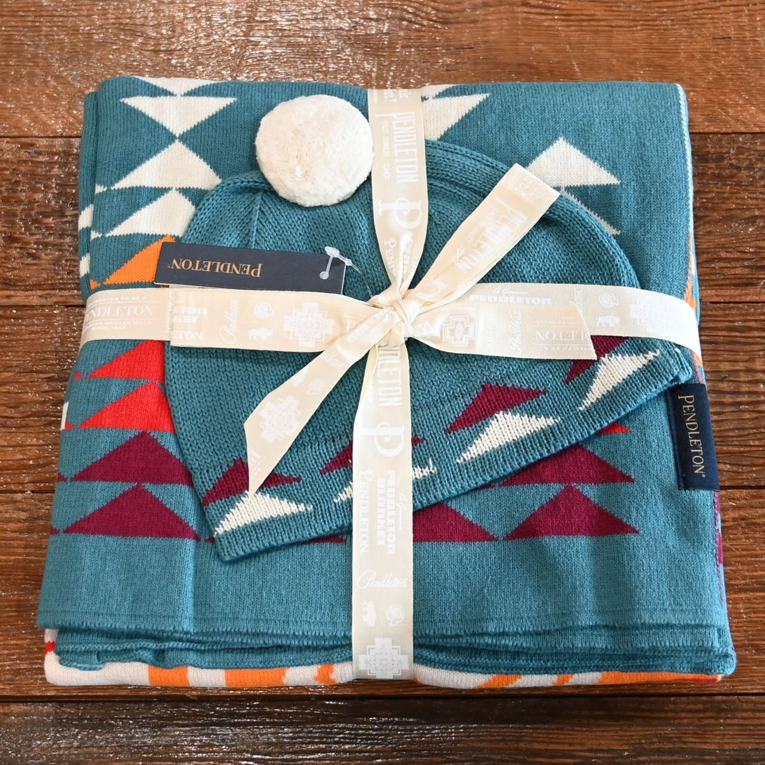 View of Pendleton knit baby blanket and beanie set in Harding Teal organic cotton