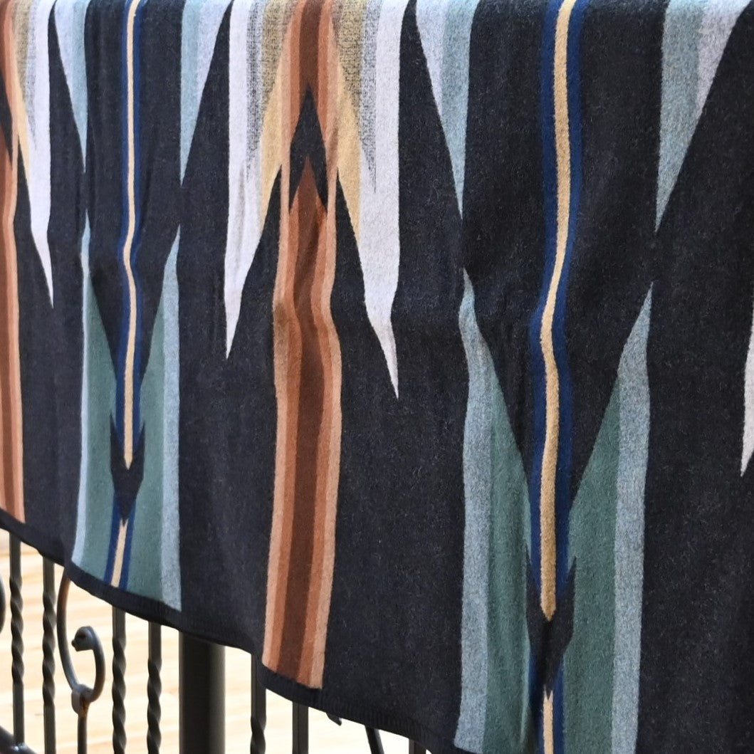 View of Pendleton Wyeth Trail Queen blanket in Oxford with geometric jacquard design