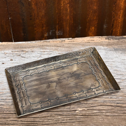 View of silver stamped tray