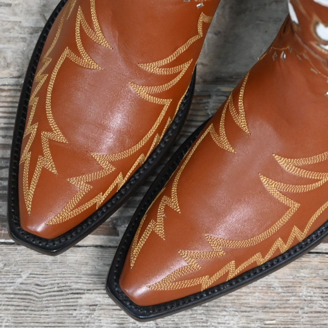 View of Stallion Ladies O.S. "Bronco" boots in cognac calf with bone, red, and green inlays