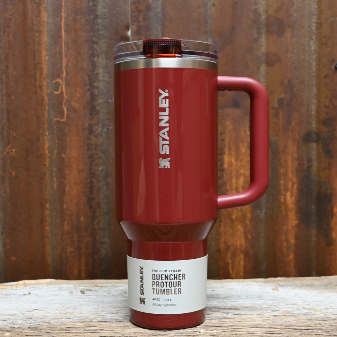 Stanley Quencher ProTour Flip Straw Tumbler 40 oz in Cranberry Gloss with flip straw lid and ergonomic comfort-grip handle