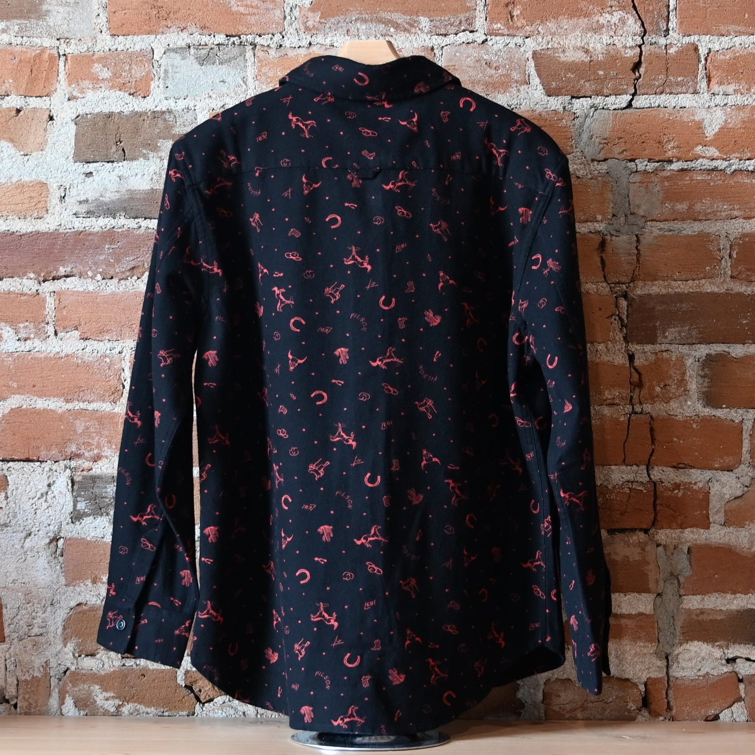 Filson ladies Rangeland flannel shirt in black with pink Western detail, spread collar, chest pockets