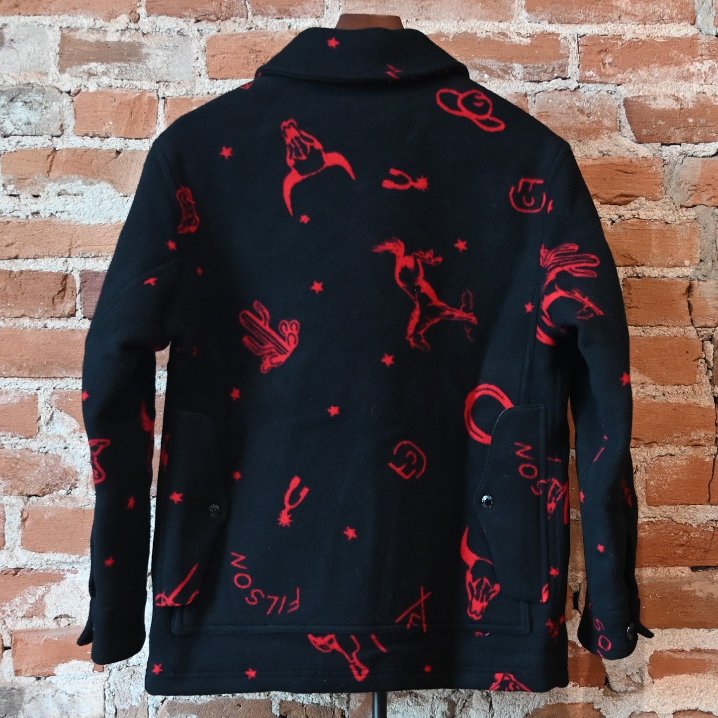 Filson Ladies Jacquard Wool Cruiser Jacket in Black and Red Western pattern with button front and utility pockets