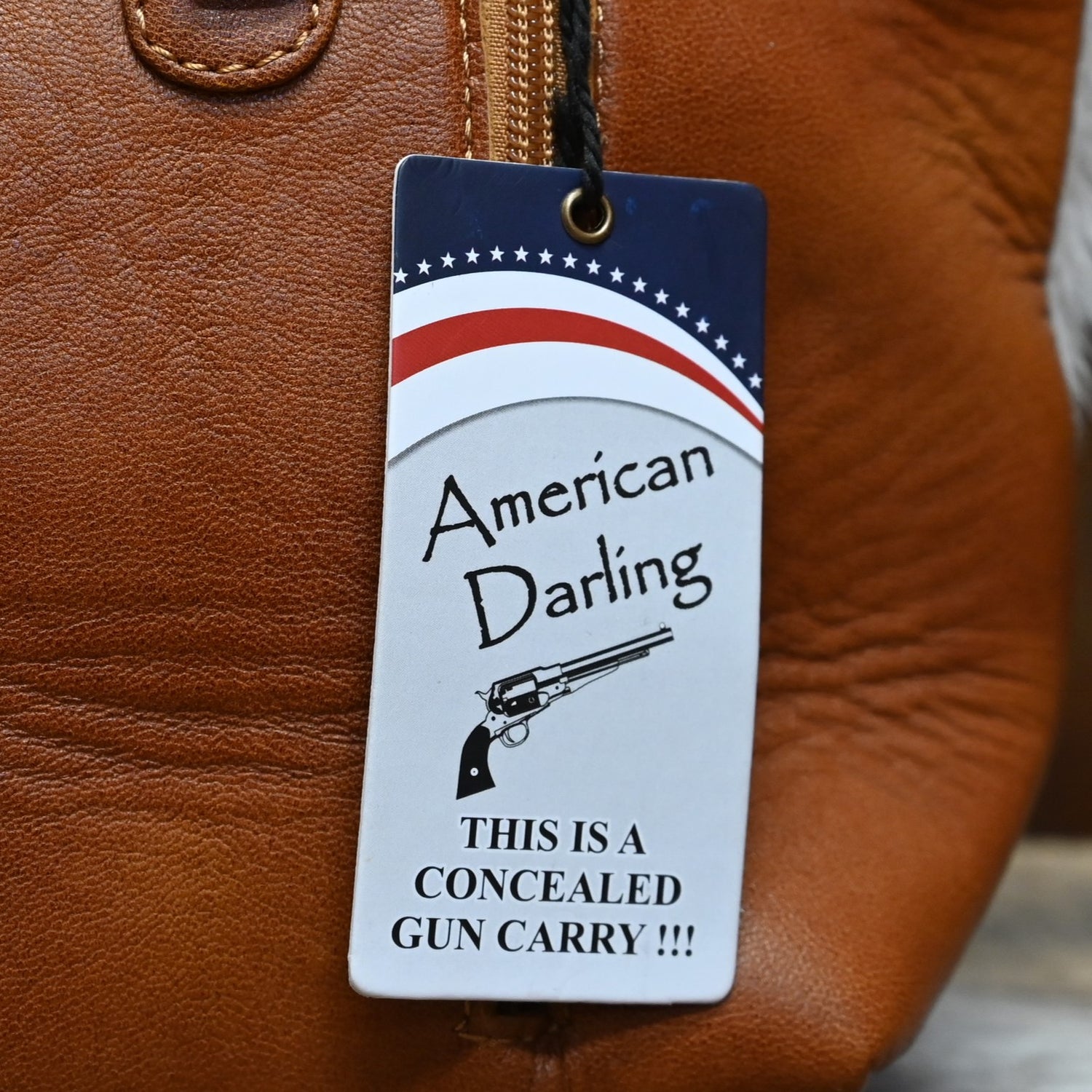 American Darling Hair On Tooled Tote Bag with Zipper Closure view of tag