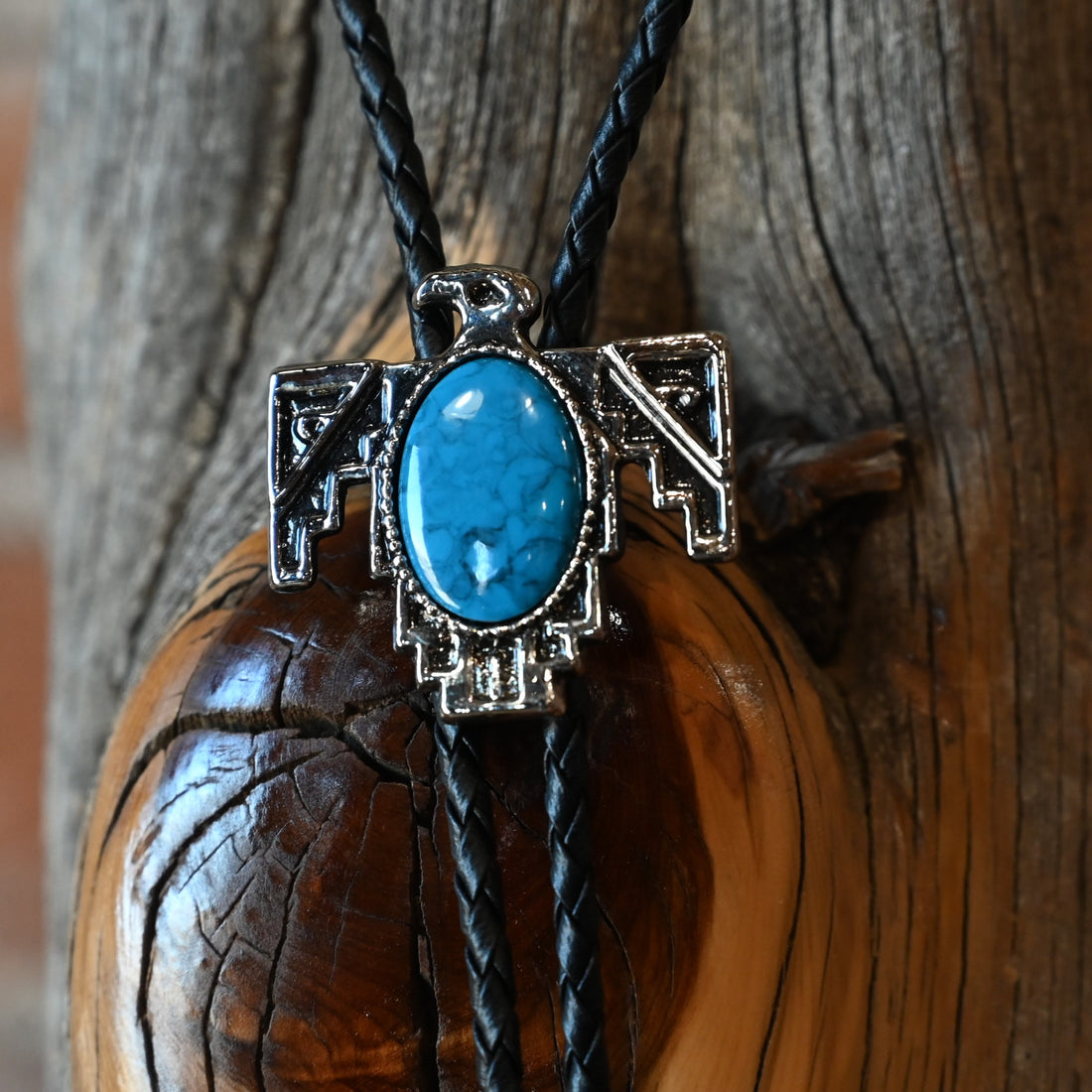 Rockmount Thunderbird Bolo Tie with silver thunderbird slide and large stone inlay on black leather cord