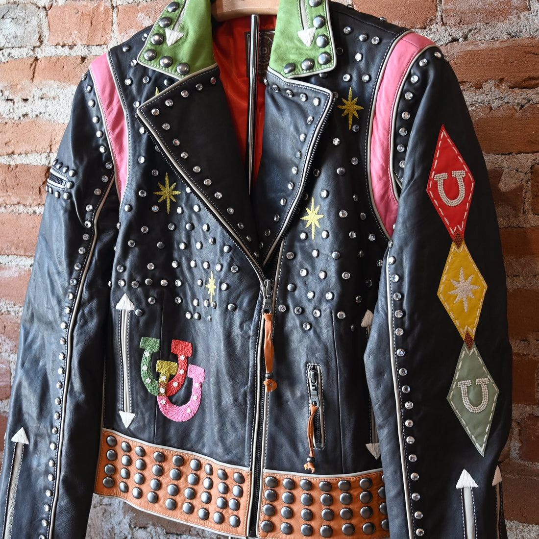 Double D Ranch Atomic Ranch bronco brown biker jacket with fringe, studs, crystals, and starburst embroidery