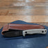 ESEE Ashley Emerson hunting knife with 1095 carbon steel blade and leather sheath, 2025 edition
