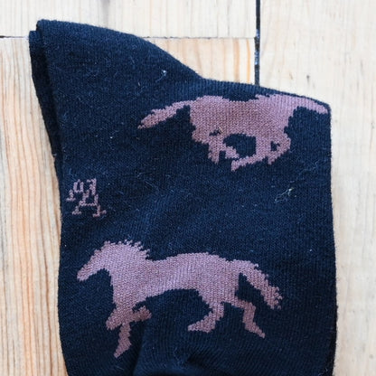 View of Kids Austin Accent Socks in Black with Brown Horses design.