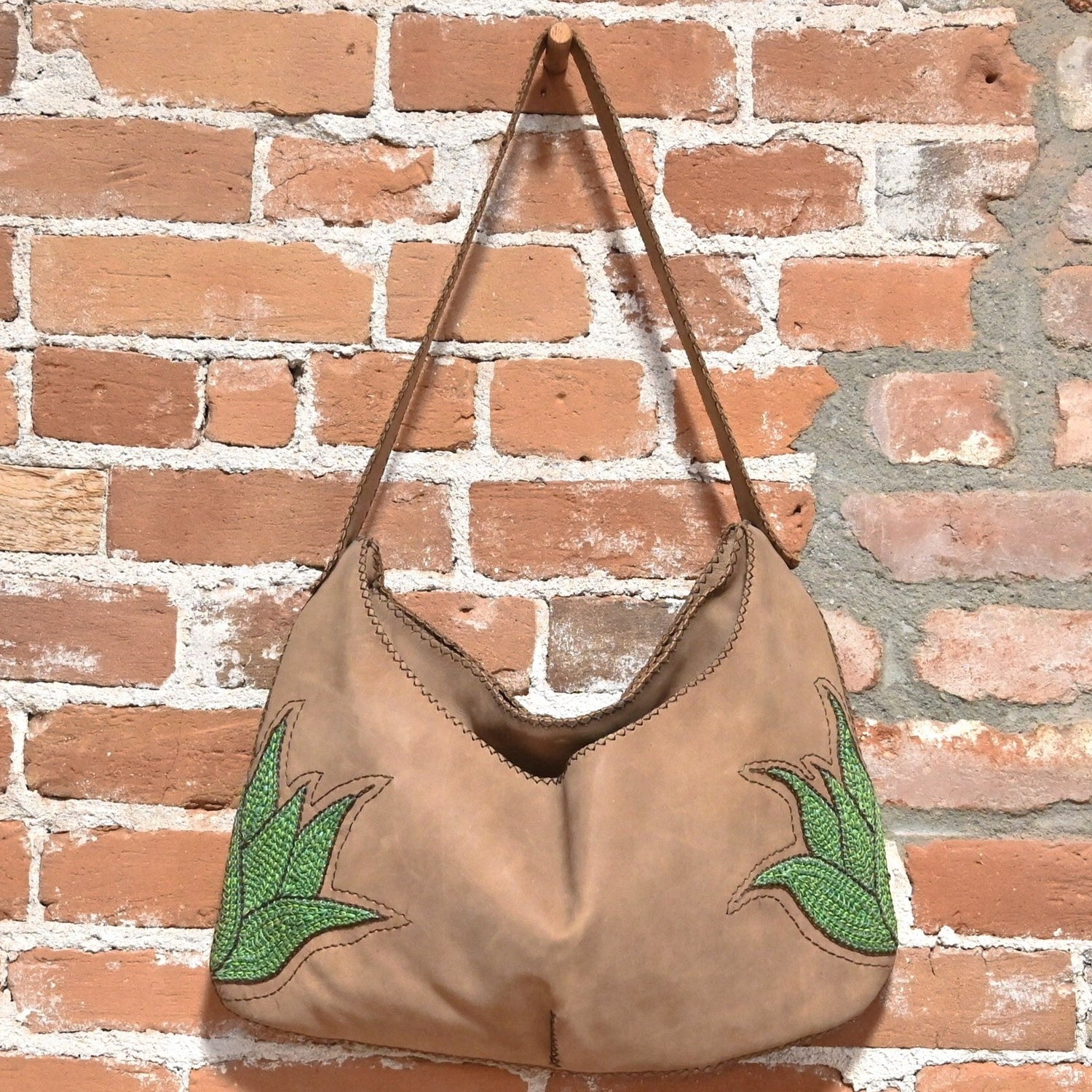Purse with Green Leaves view of bag hanging