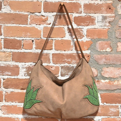 Purse with Green Leaves view of bag hanging