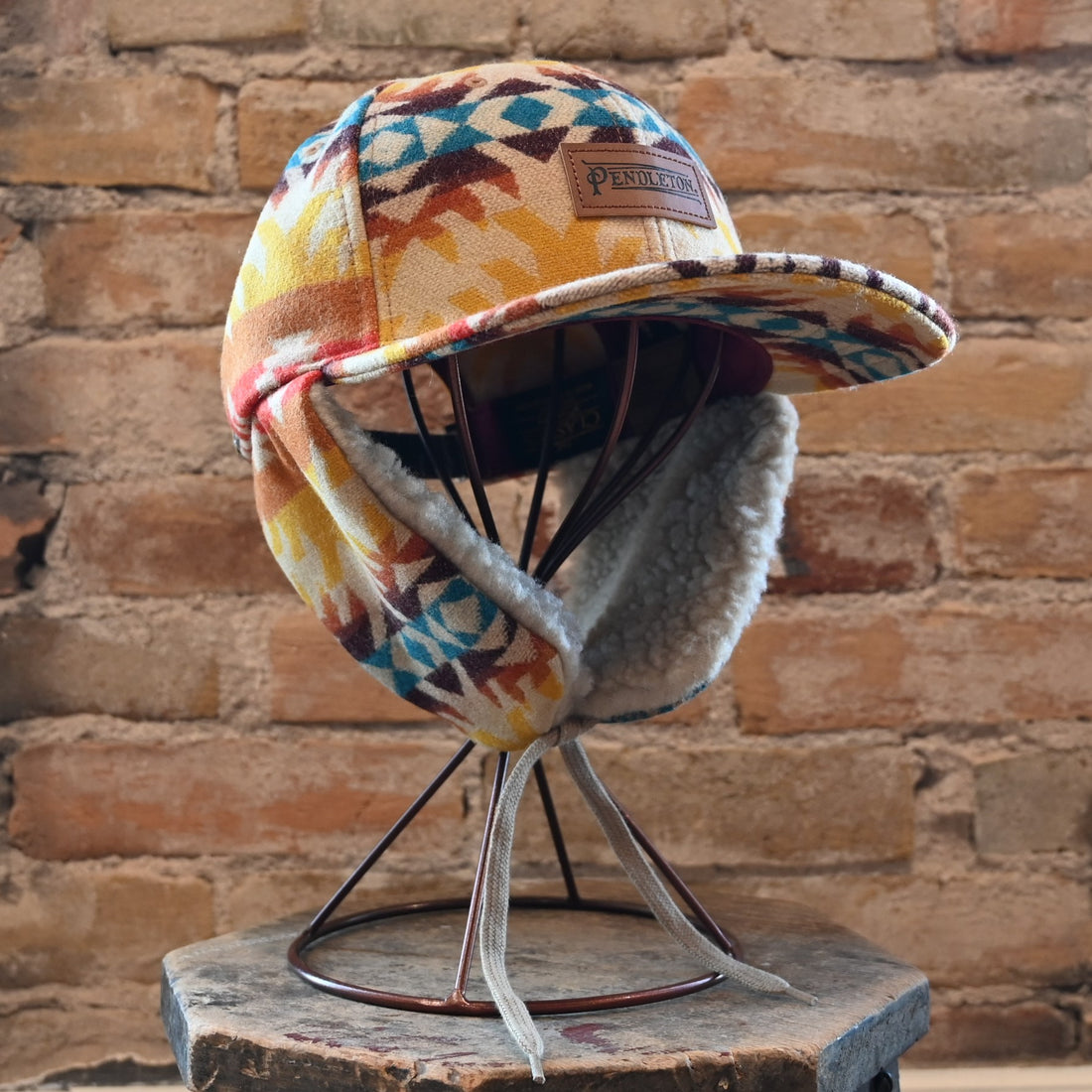 View of Pendleton Timberline wool cap in Pasco pattern with sherpa ear flaps and tie closure