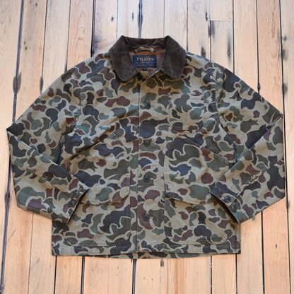 Filson Canvas Outfitter Jacket in shrub camo with dark brown corduroy collar and cargo-style pockets