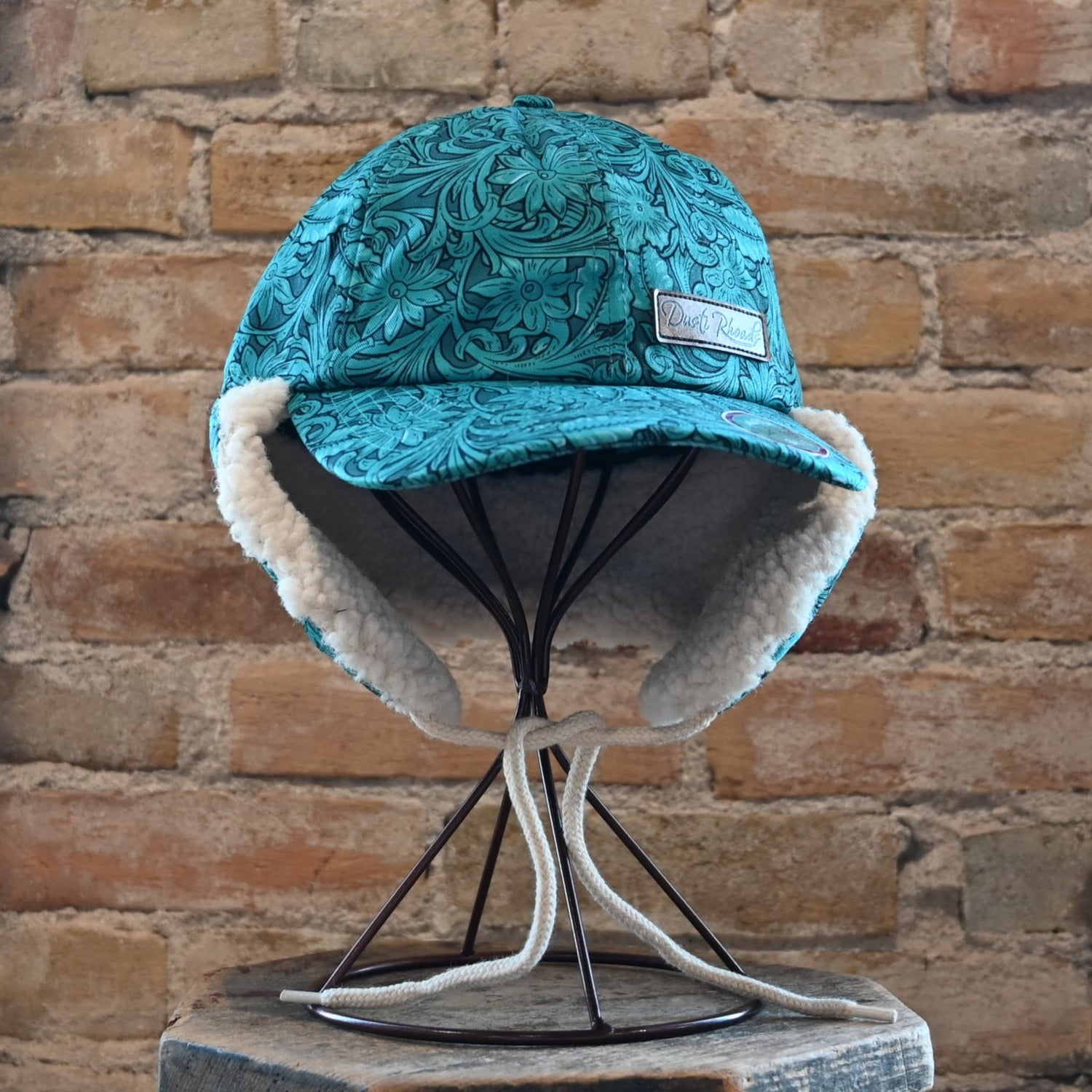 View of hat with ear flaps down