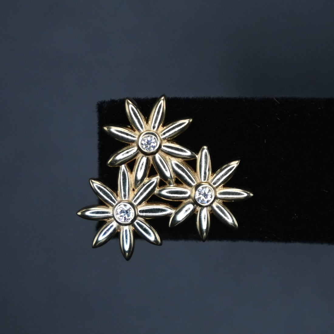 DAISY TRIO EARRINGS- 6- .12 CT TOTAL EF VS DIAMONDS- MINED- 18K YELLOW GOLD close up view