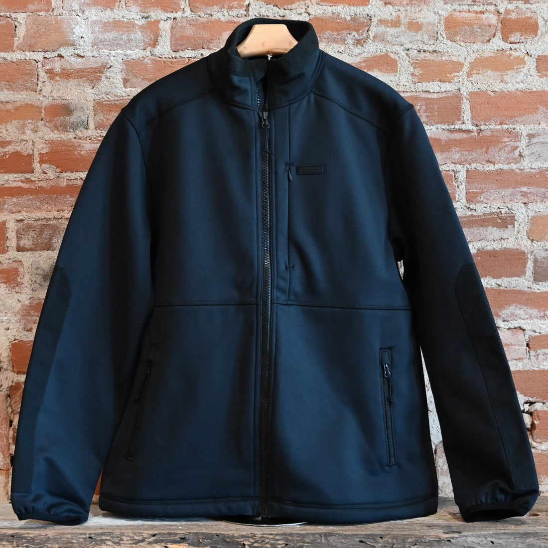 View of Filson Granite Spire Fleece Jacket featuring Cordura® nylon-reinforced forearms and microfleece-lined handwarmer pockets