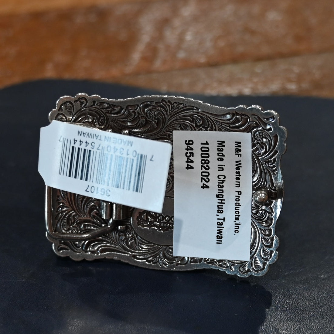 Nocona youth rectangle bull rider and USA flag belt buckle with rope edge border