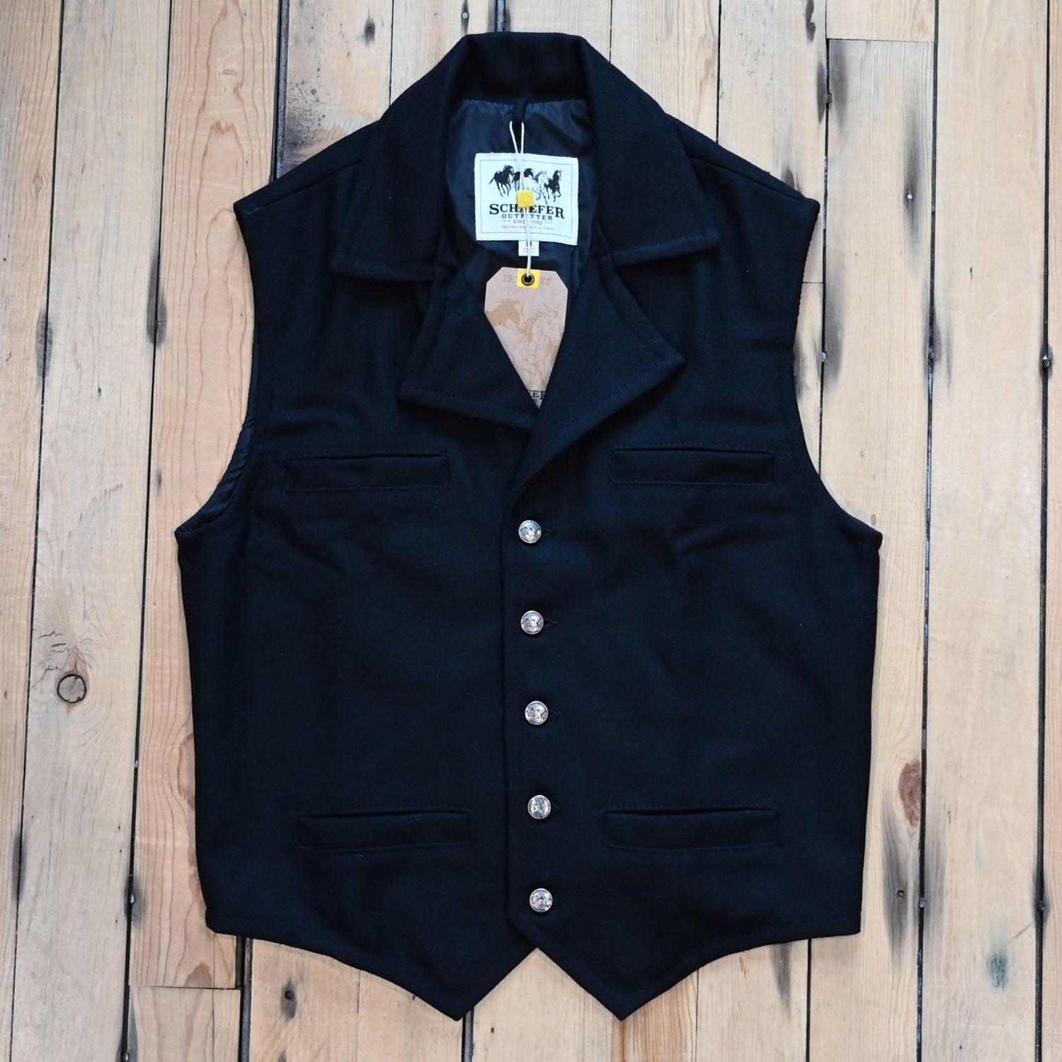 Schaefer Cattle Baron black wool vest with four pockets and tailored Western fit