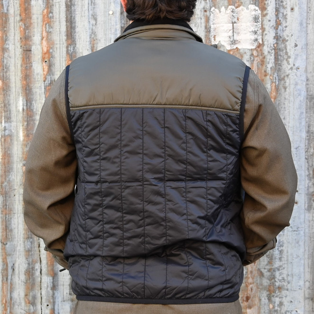 Filson Mens Ultralight Vest view of back in black/olive