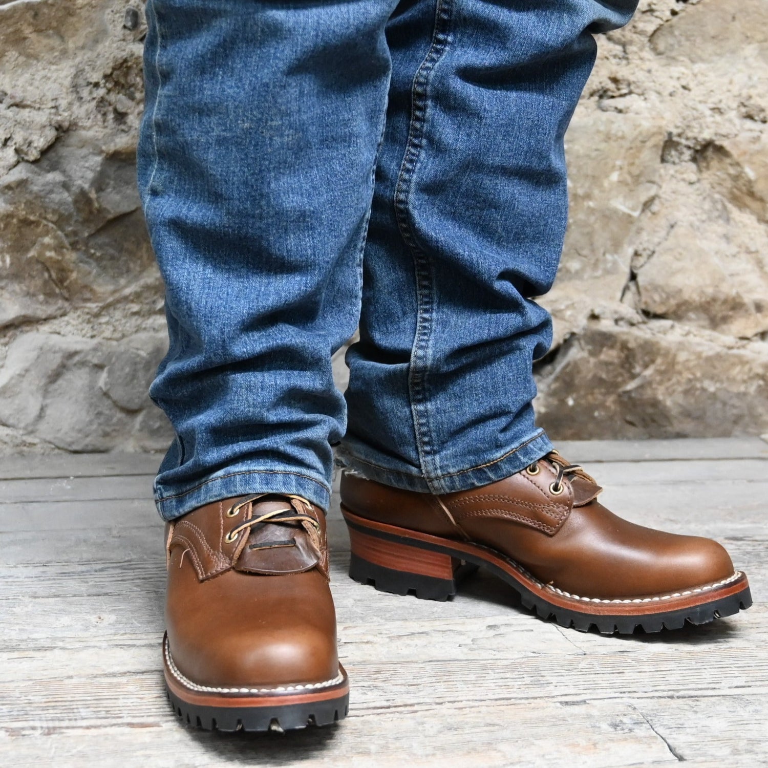 Nicks Urban Logger in British Tan view of front and side of boot on model size 10.5