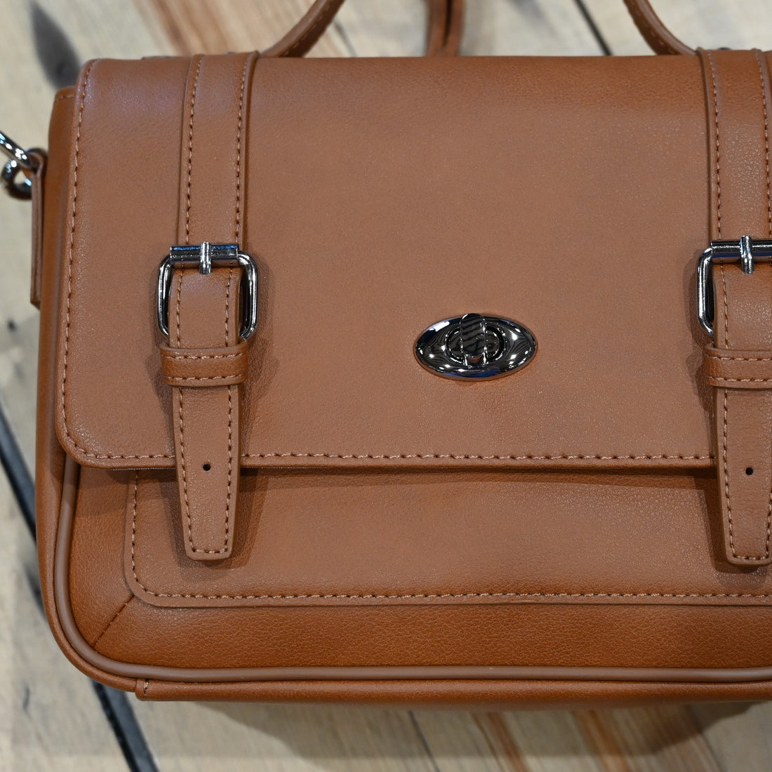 Gun Toten Mamas saddle brushed cowhide schoolgirl crossbody satchel with flap and conceal carry compartment