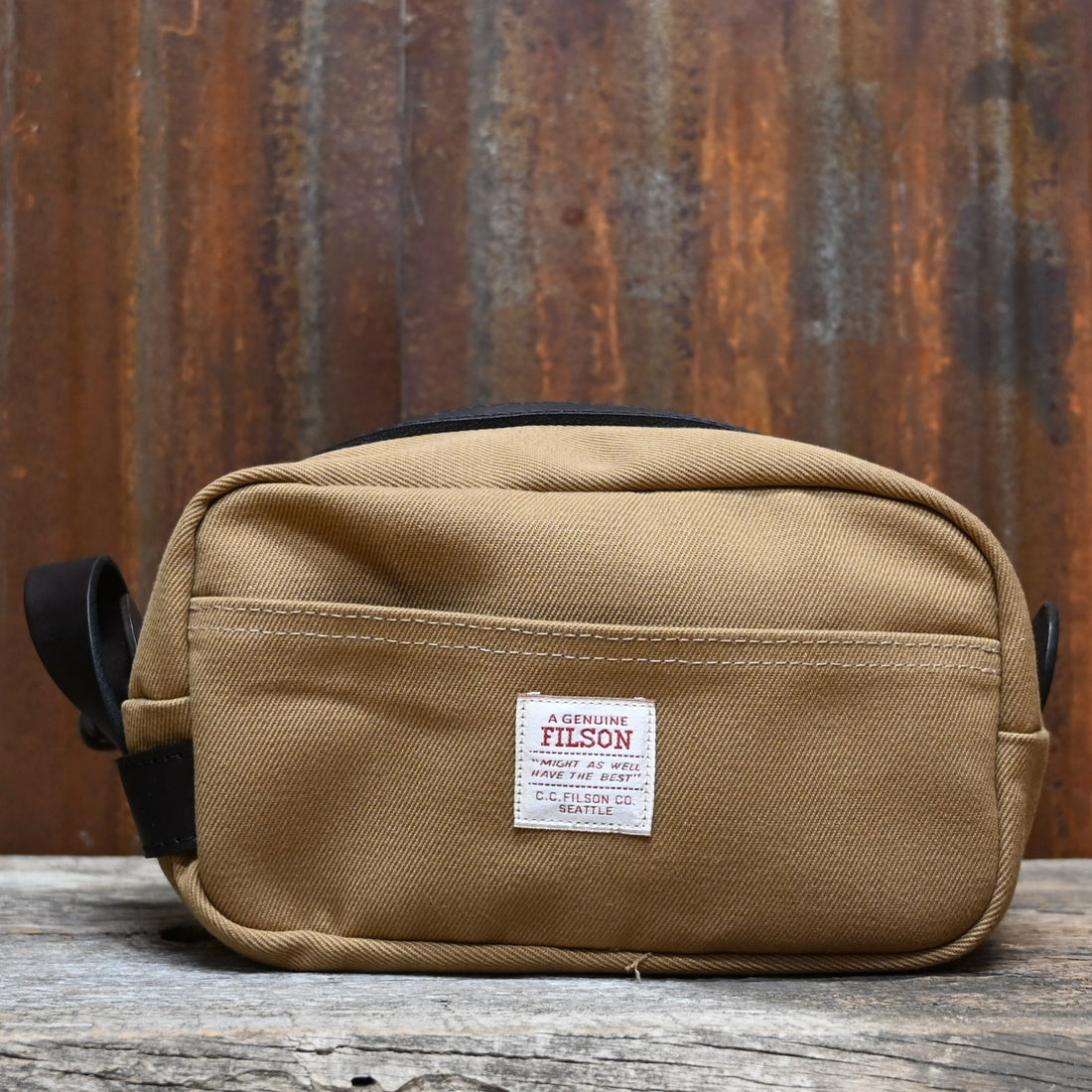 View of Filson Lightweight Travel Kit with Leather Loop in Tan featuring Bridle Leather accents and waterproof nylon lining