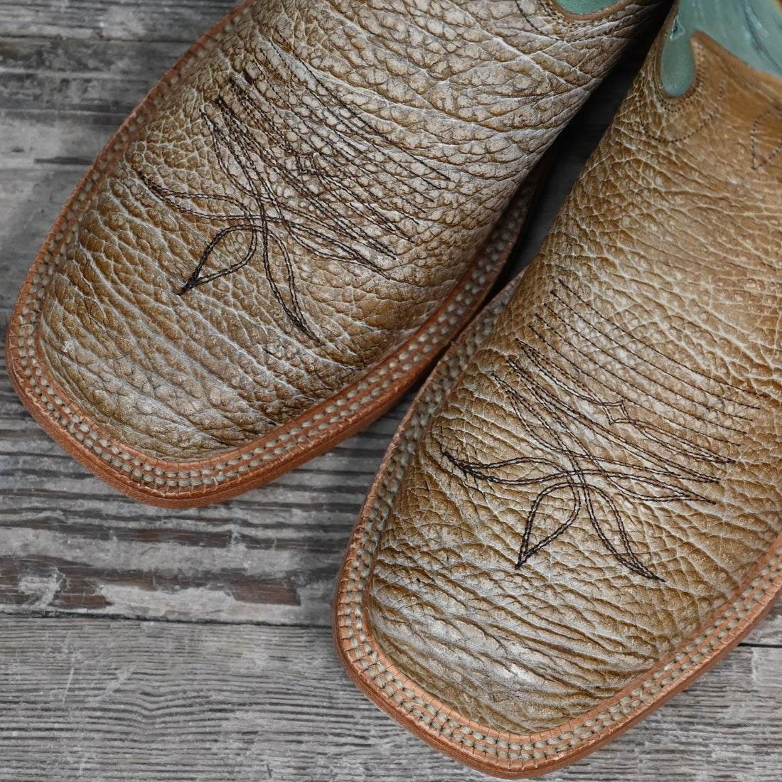 View of Hyer HAZELTON 11" boots showcasing tan bullhide leather vamp and mint vintage goat upper with broad square toe and Stockman block heel