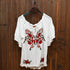 Ladies Short Sleeve Tie Front Embroidered Blouse in White view of front