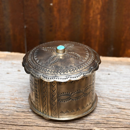 View of round box with turquoise lid